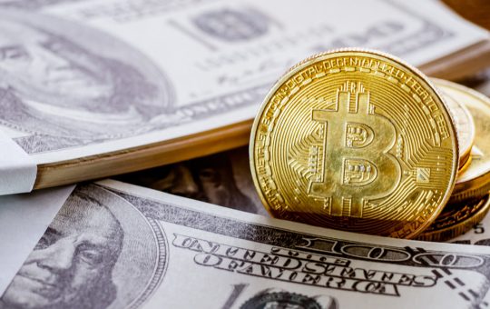 US Dollar and Bitcoin placed together to show investment concept